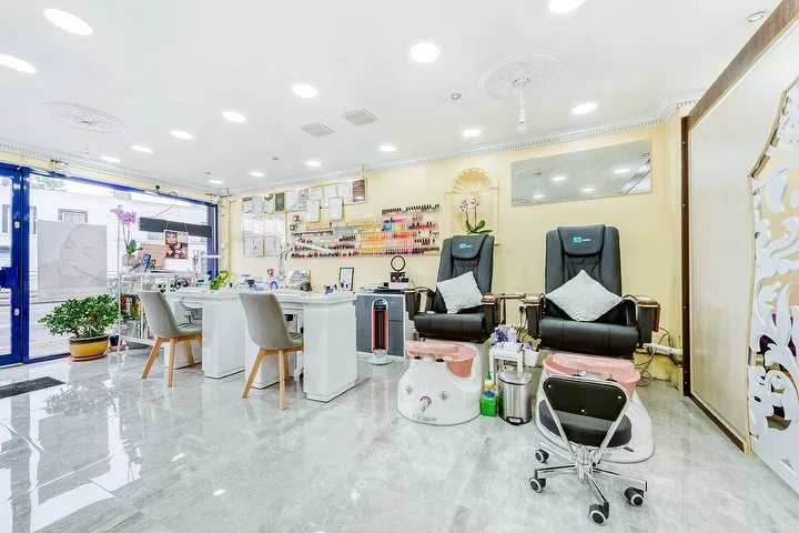 Crown Beauty salon floor with nail stations