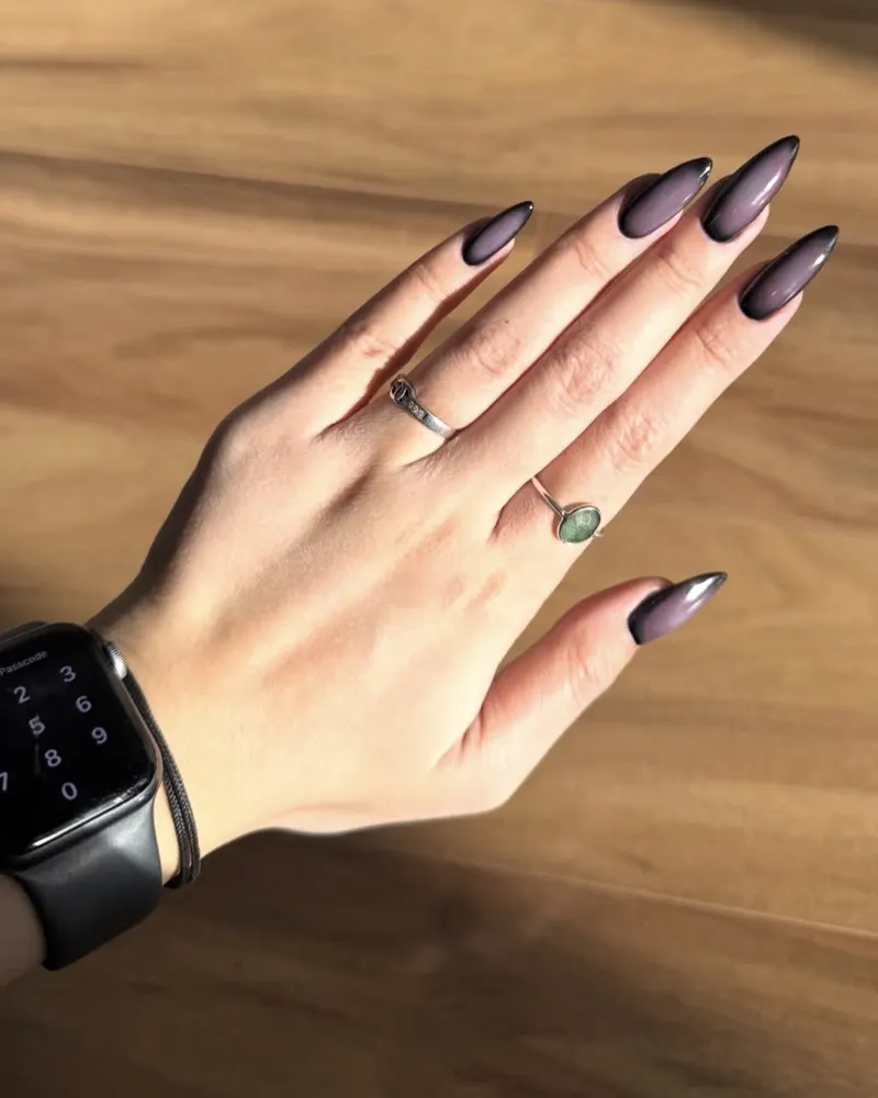 Black aura stiletto nails