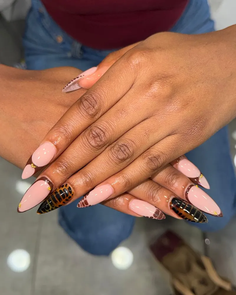 Brown and pink nail art with checks