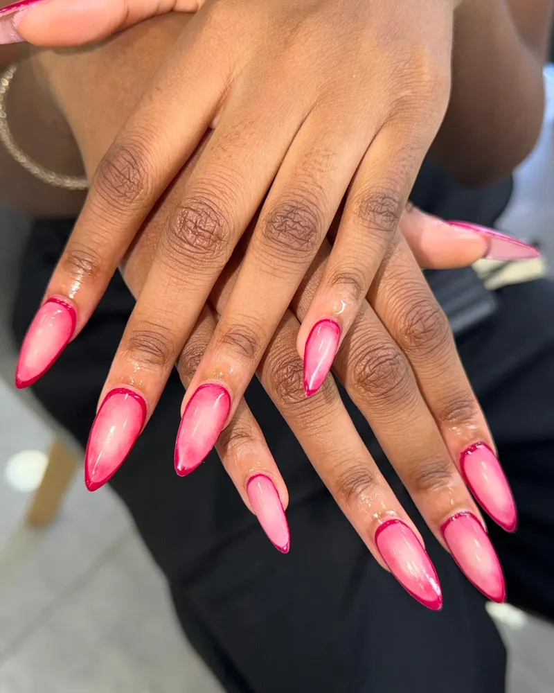 Pink ombre stiletto nails with outlined tips