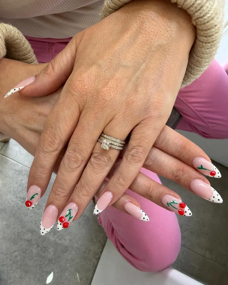 White French tips with cherries and polka dots