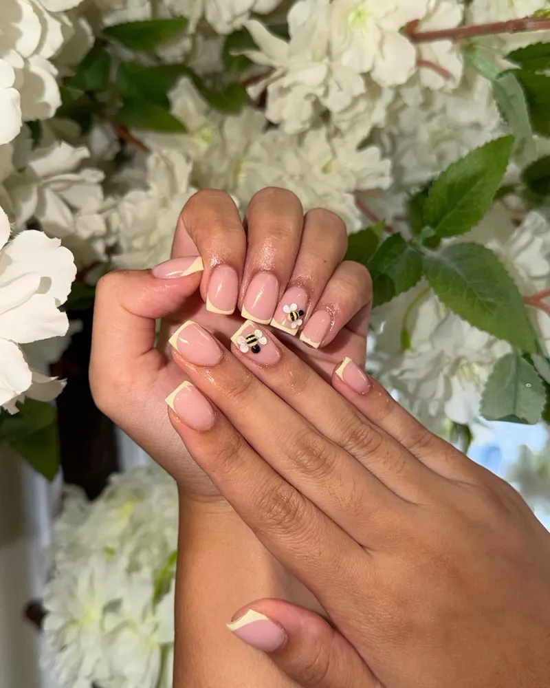 Milky nude nails with a small accent design