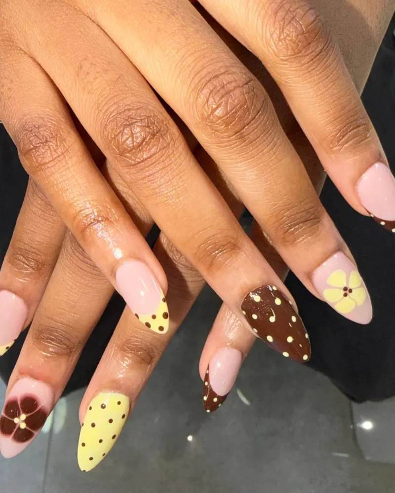 Brown and yellow polka dot nails with flowers